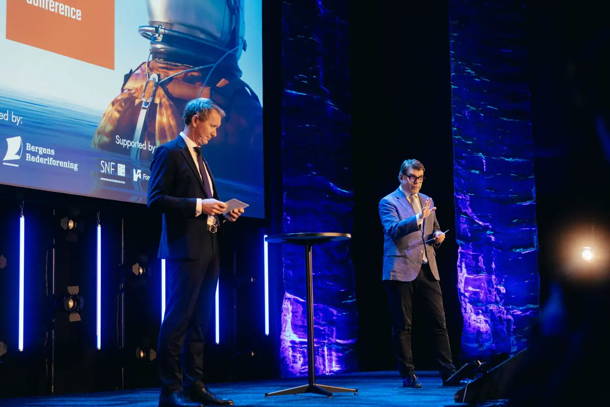 Two hosts on stage at Bergen International Shipping Conference