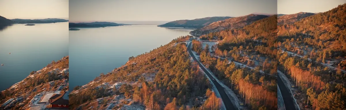 Fjord and road through autumn forest in golden light