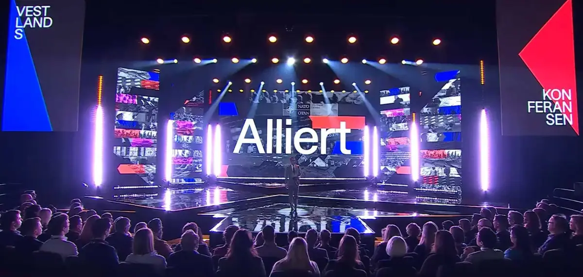 Stage in Grieghallen at Vestlandskonferansen with a large screen and audience